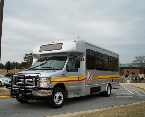 brite bus driving away from bus stop