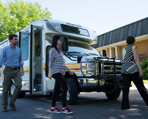 passengers getting off brite bus