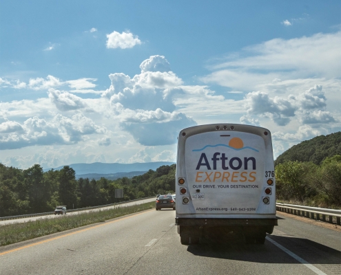 Afton Express bus driving on road