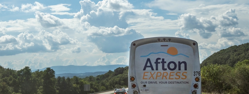 Afton Express bus driving on road